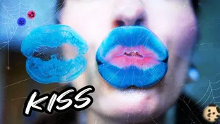 Goth girl kisses with big blue naughty lips