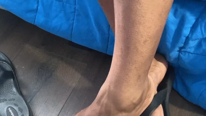 Veiny feet in sandals and sandal claps