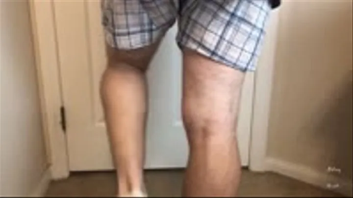 Man Does Calf Flexing With X-Mas Socks