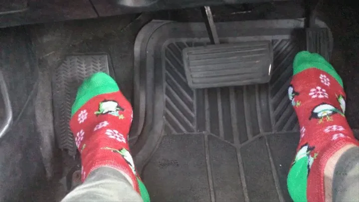 Guy Pumps Pedals In X-Mas Socks