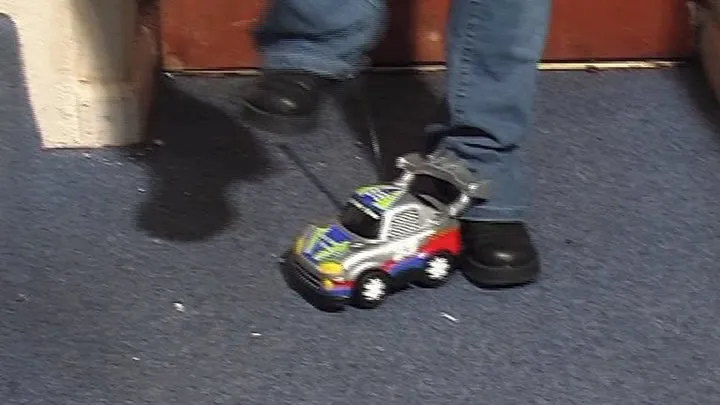 Charlotte Crushes A Big Toy Car Under Her Boots