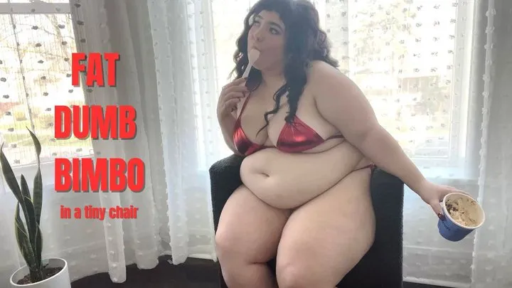 FAT DUMB BIMBO in a tiny chair!