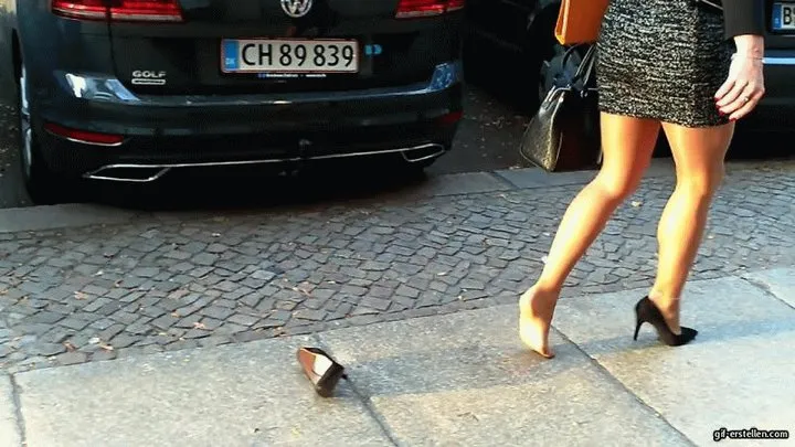 Businesswoman with only one shoe