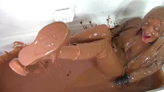 Leather Misses Takes a Chocolate Slime Bath in White Jeans