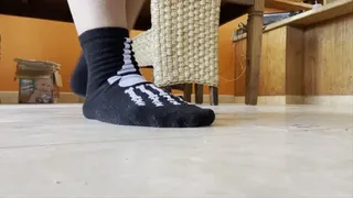 Dirty skeleton socks on housewife
