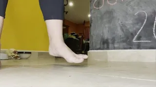 Dirty feet rolling a clay snake