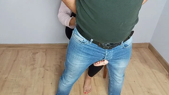 Jeans ballbusting from behind