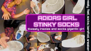 Gigantic girl shows her stinky socks and her sweaty Adidas shoes also her insoles sweaty feet, shoeplay dipping