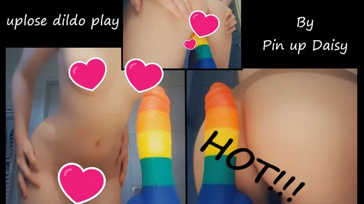 Close-up rainbow dildo fucking