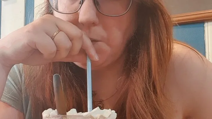 Girl Drinking Chocolate Milkshake