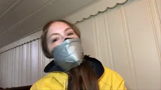 rachel secure tape wrap gag in raincoat