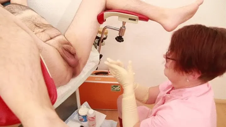 Medical ass fisting by mature head nurse on the gyno chair