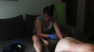 Wife fist her husband in livingroom