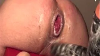 Rough anal treatment with balled fists and a rippled dildo