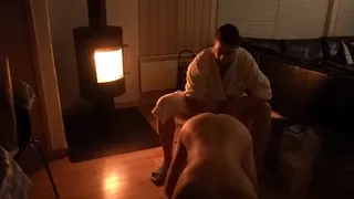 Femdom fisting at the fireplace