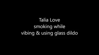 Talia Love Vibes and plays with her glass dildo while smoking