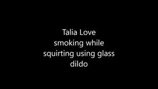 Talia Love smokes while she squirts on her bed