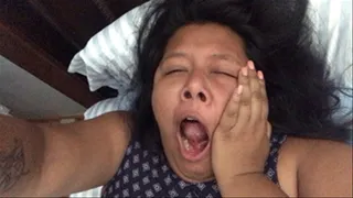 Overhead yawning in bed