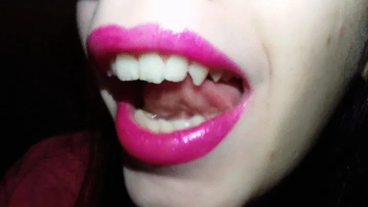 I show you my teeth very close to camera - clip in slow motion