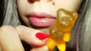 Chewing and eating gummy bears in slow motion