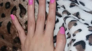 Watch my hand and my hot pink fingernails