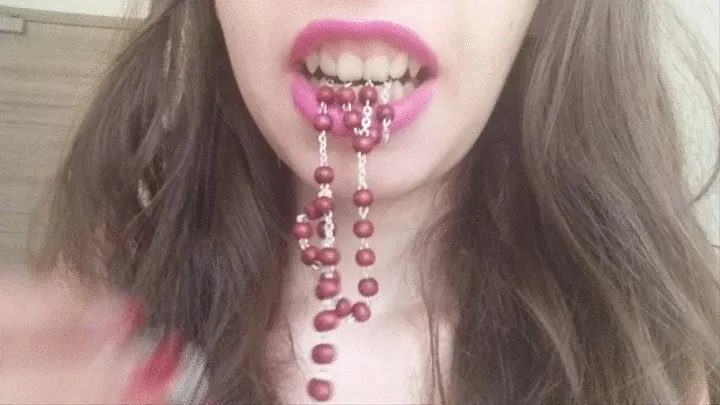 a rosary in my mouth