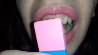 I destroy a pink eraser with my teeth