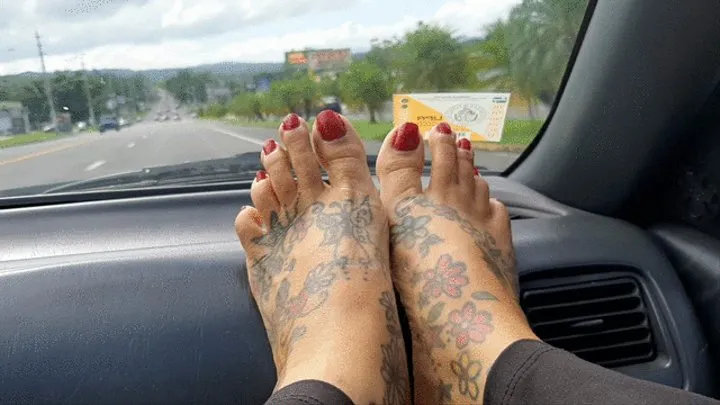 Tattooed feet Pretty Pink Toe Nails wiggly toes on Car Dash take a ride with me