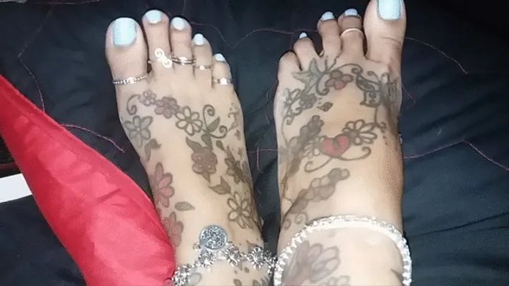 Pretty light blue long toenails and toes with toe rings Sexy feet propped up on pillows with anklets foot fetish fun