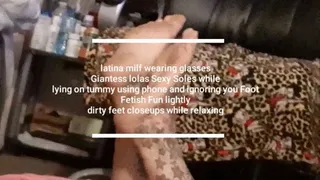 latina milf wearing glasses Giantess lolas Sexy Soles while lying on tummy using phone and ignoring you Foot Fetish Fun lightly dirty feet closeups while relaxing mkv