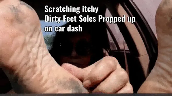 Scratching itchy Dirty Feet Soles Propped up on car dash