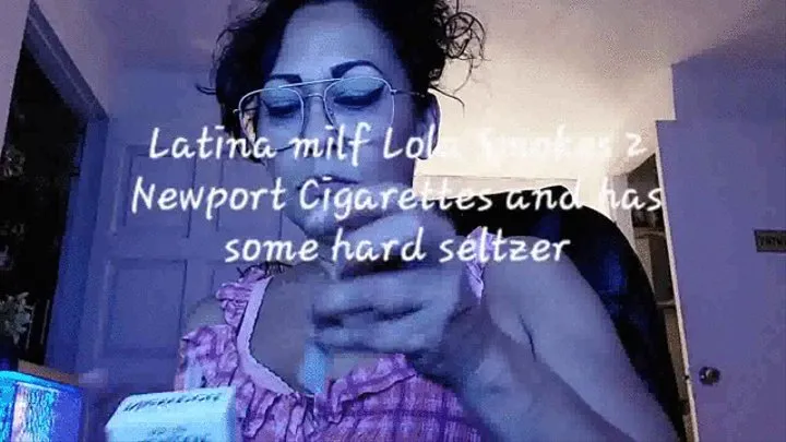 Latina milf Lola Smokes 2 Newport Cigarettes and has some hard seltzer mkv