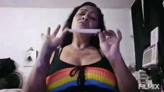 Stabbing your balls Tattooed Latina Milf Domina insults your tiny penis and big balls and punishes and pierces them over and over with a long tattoo needle Bilingual Spanish English Big Balls Humiliation Domination orange ball piercing punishment