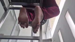 Under Giantess Unaware Latina Milf Lolas Sexy Soles Foot Fetish cam Wiggly toes Rear view while she sits on a balcony by the beach on a high stool mkv
