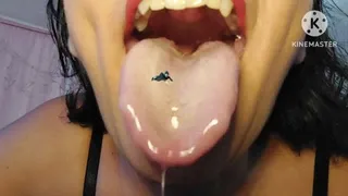 SALIVATING GIANTESS VORE GIANTESS HAS A TINY SWIMMER ON HER LONG WET TONGUE EATS HIM SHORT CLIP