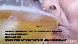 Giantess drinks tiny swimmer
