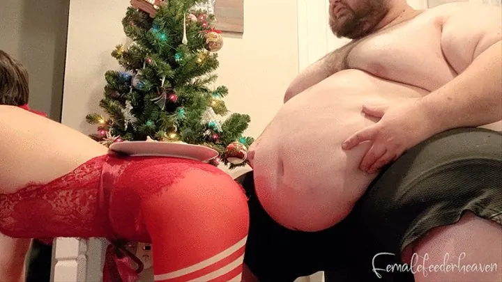 Santa finds a Christmas treat under the tree