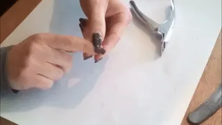 Repair of one broken nail in black Glitter nailpolish