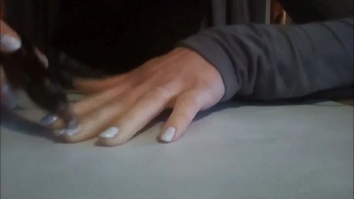 Repair of one nail in white nailpolish