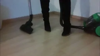 Vacuuming in black Overknee Boots