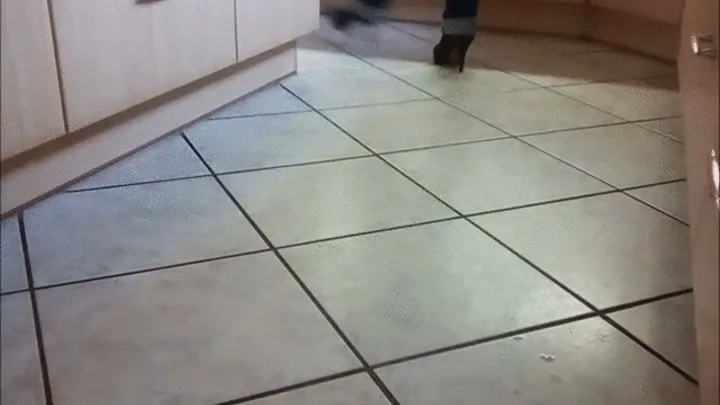 Vacuuming the Kitchen in black Ankle Boots