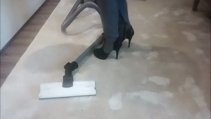 Lady2deluxe is vacuuming and Posing with her Grey Boots