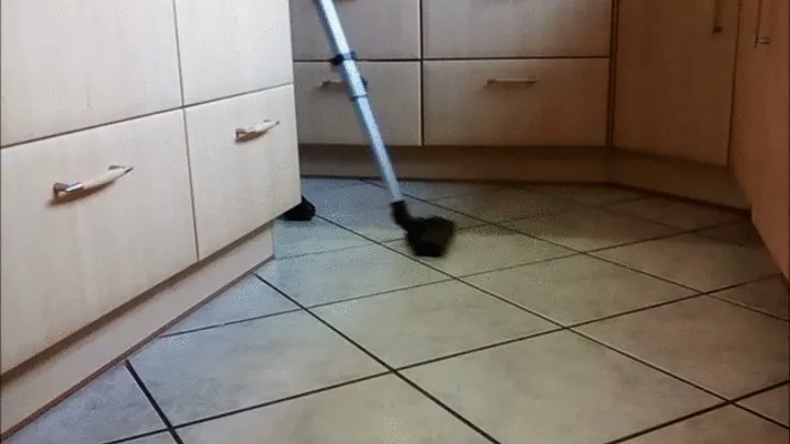 Vacuuming in my Kitchen with my black Overknee-boots