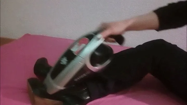 Lady2deluxe is Vacuuming with her little dirt devil only her black Ankle Boots