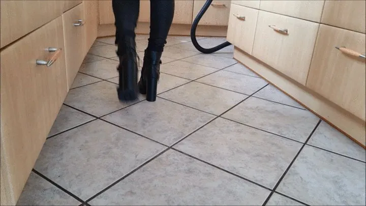 Vacuuming with black Simmi Boots