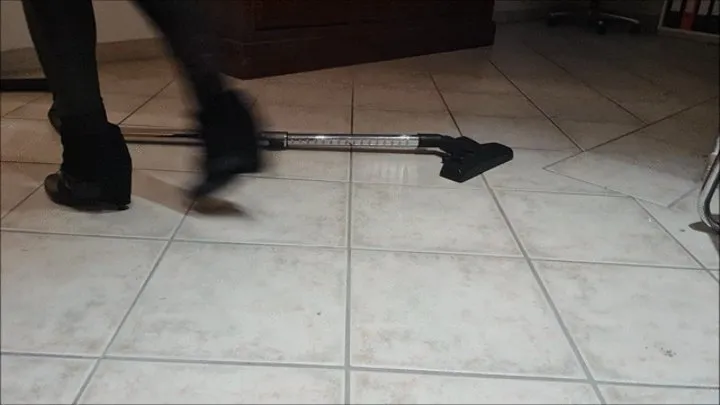 Vacuuming in my office with black ankle Boots with glitter Stones