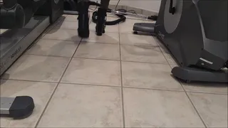 Vacuuming with black boots in my private gym