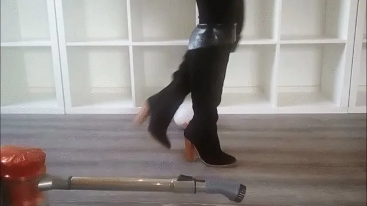 Vacuuming colourfull Confetti with black Overknee Boots