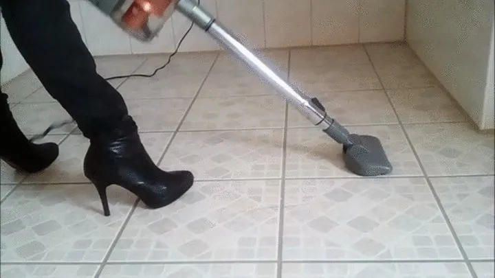 Vacuuming with Ankle Boots in the Bathroom