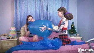 Q485 Ava and Leya blow big plastic bags to pop